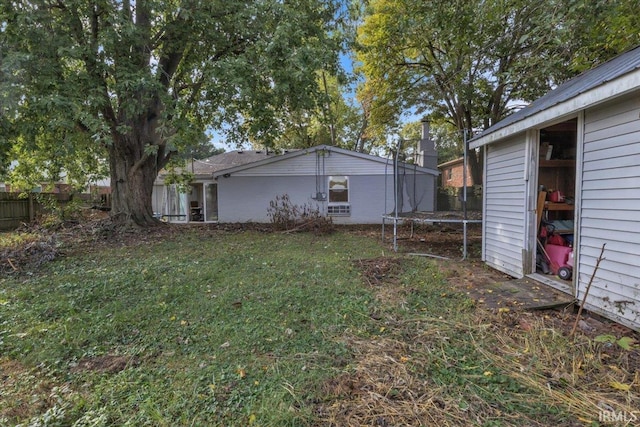 view of yard featuring a trampoline