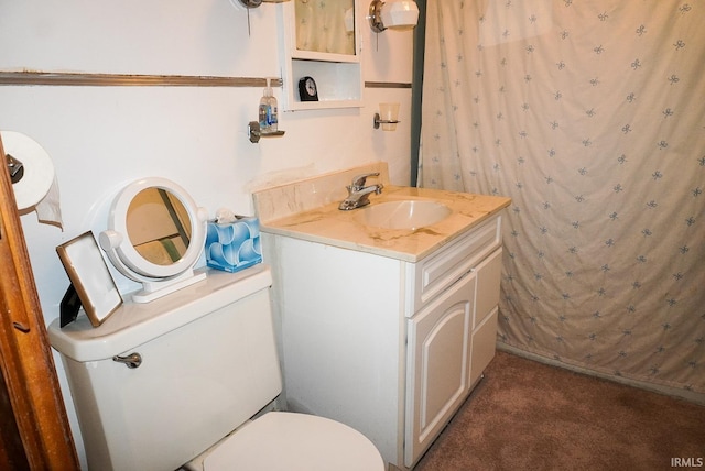 bathroom featuring vanity, toilet, and a shower with shower curtain