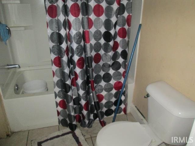 bathroom with toilet, shower / bathtub combination with curtain, and tile patterned floors