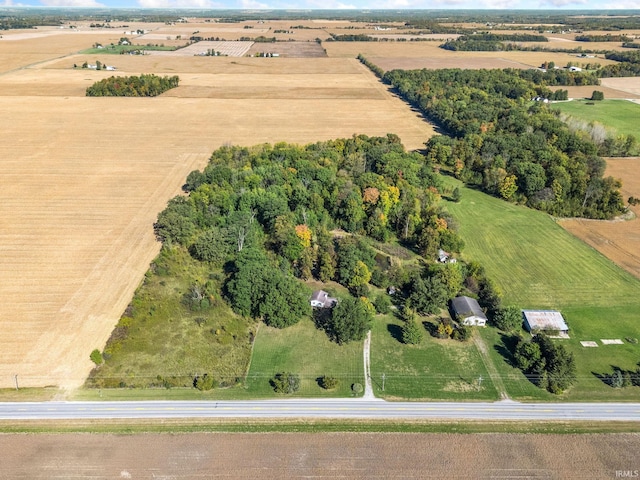 birds eye view of property featuring a rural view