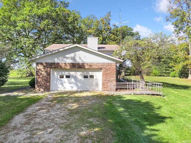 garage with a lawn