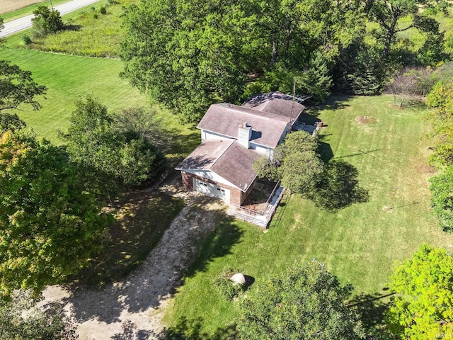 birds eye view of property with a rural view