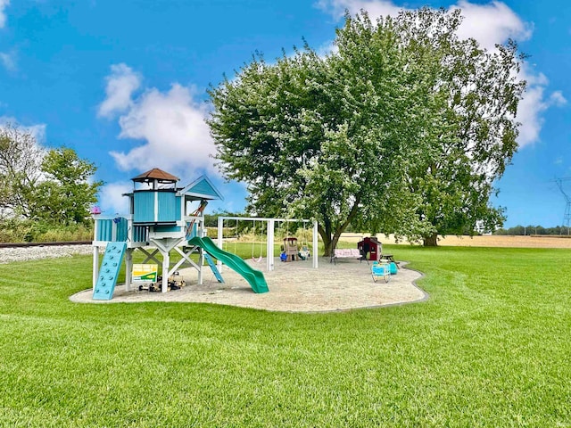 view of play area featuring a lawn