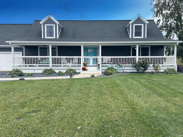 view of front of house featuring a front lawn and covered porch