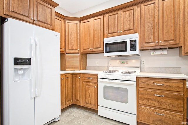 kitchen featuring white appliances