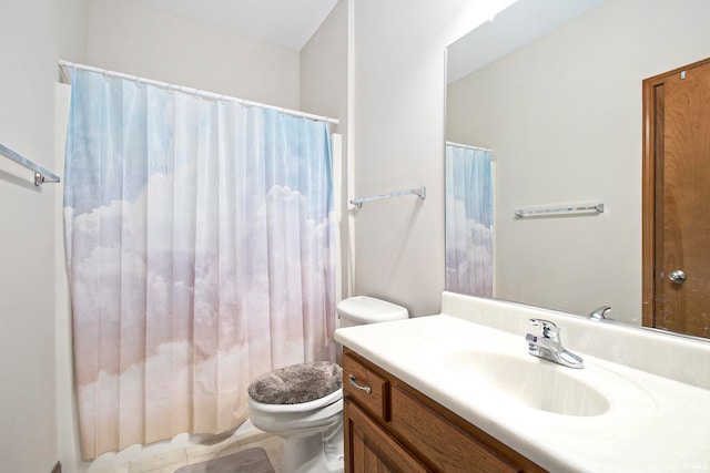 bathroom with walk in shower, vanity, and toilet