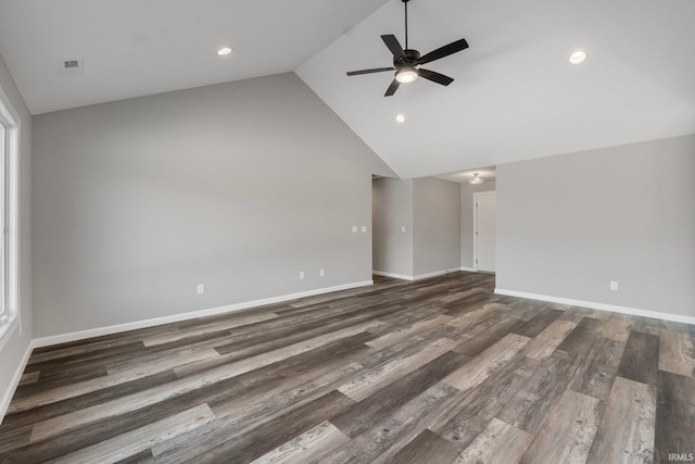 unfurnished living room with high vaulted ceiling, ceiling fan, and dark wood-type flooring