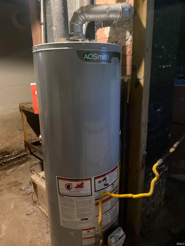 utility room with gas water heater