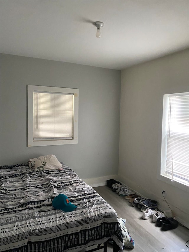 bedroom featuring hardwood / wood-style flooring