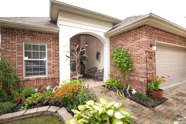 property entrance featuring a garage