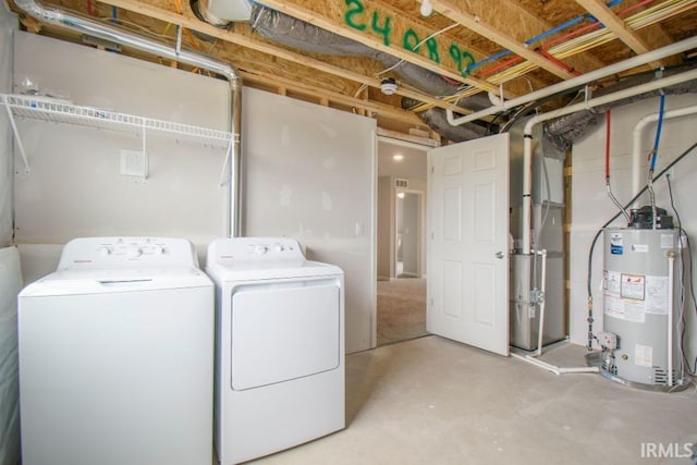 washroom with water heater, washing machine and clothes dryer, and heating unit