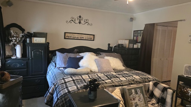 bedroom with carpet flooring, a closet, and ornamental molding