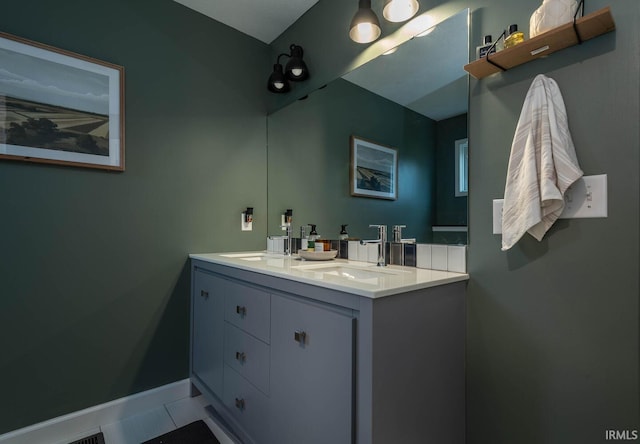 bathroom with vanity and tile patterned floors