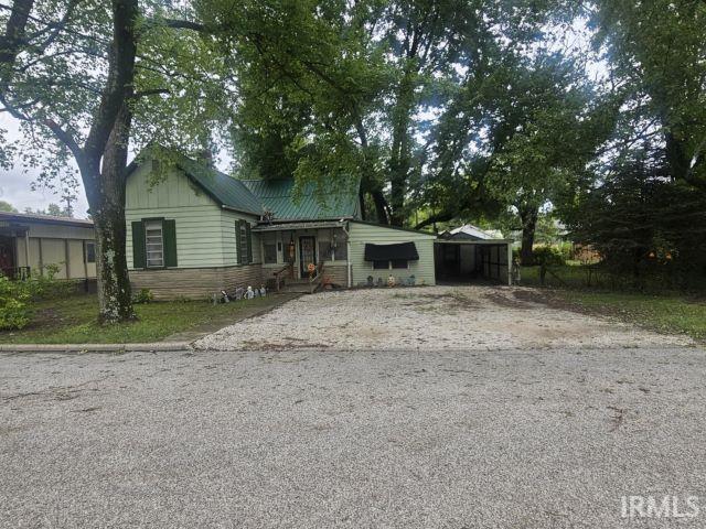 view of front of house with a carport