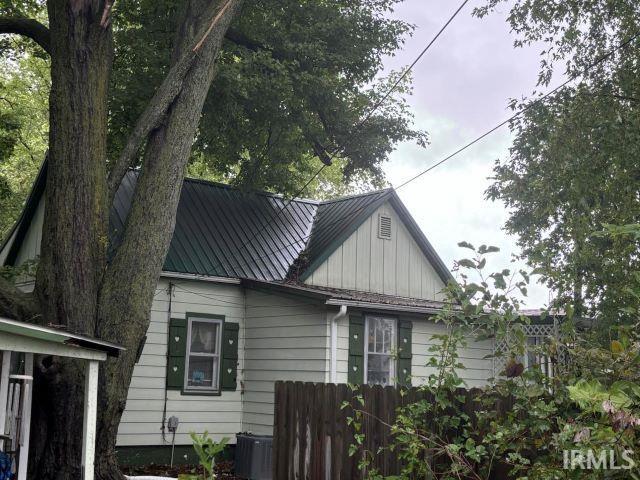 view of property exterior featuring central AC unit