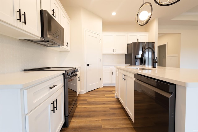 kitchen featuring black appliances, hardwood / wood-style flooring, and white cabinetry