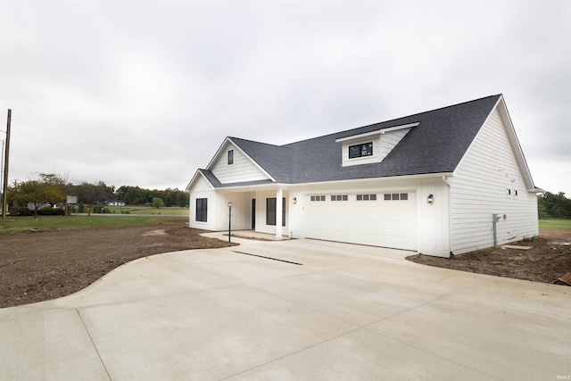 view of front of home with a garage