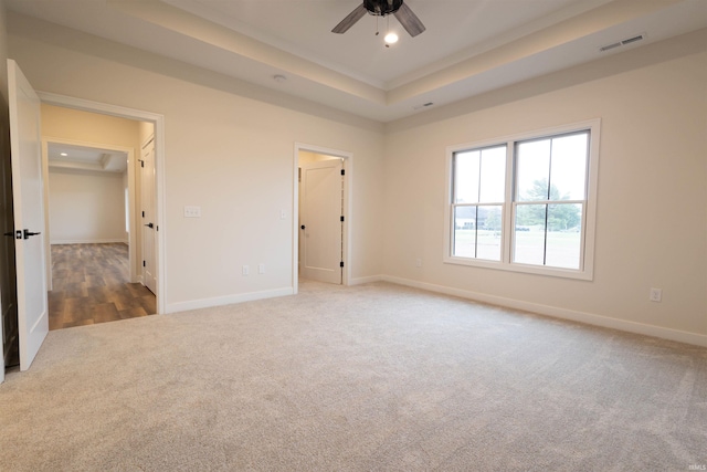 unfurnished bedroom featuring ceiling fan and carpet