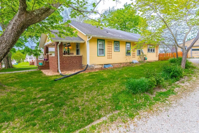 view of front of home with a front yard