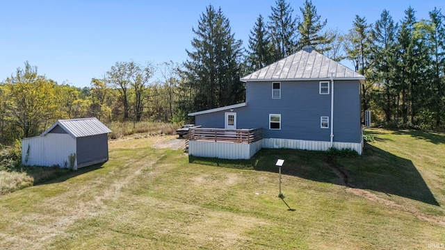 exterior space with a deck and a storage unit