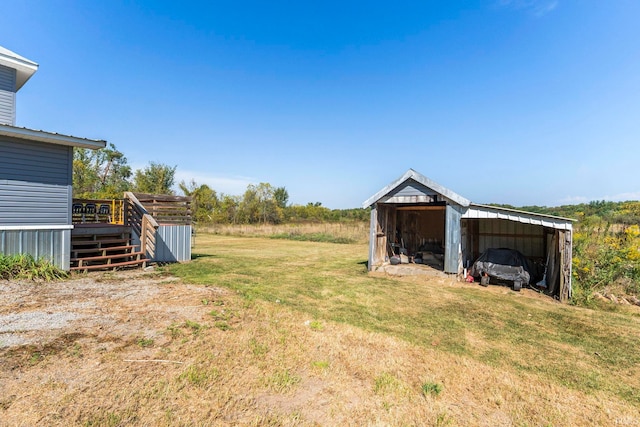 view of yard with a deck