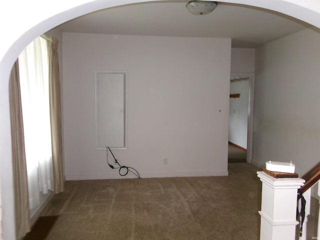 empty room with carpet flooring