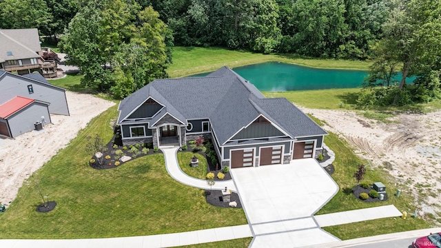 bird's eye view with a water view