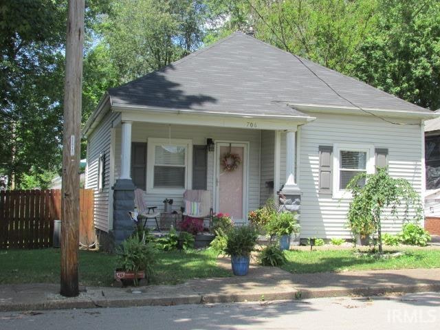 bungalow-style home with a porch