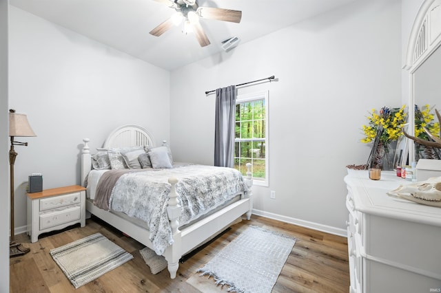 bedroom featuring ceiling fan and wood-type flooring