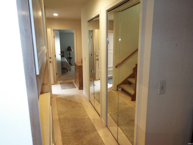 hall with light tile patterned flooring