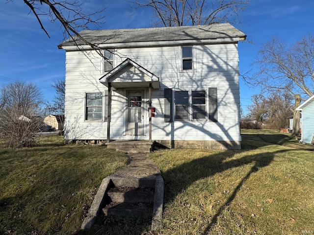 view of front of property with a front yard