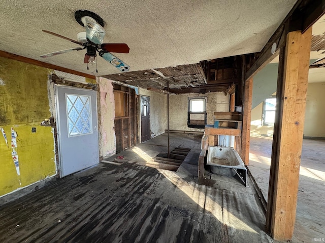 miscellaneous room featuring ceiling fan