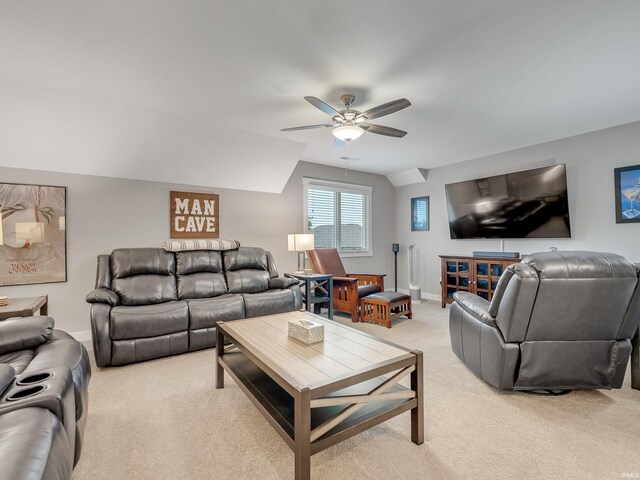 381 Elderwood Ct, Fort Wayne, IN 46845 - living area with lofted ceiling, light colored carpet, baseboards, and ceiling fan