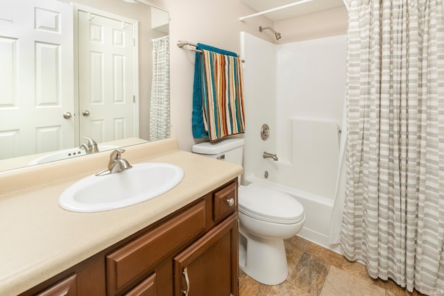 full bathroom with vanity, toilet, and shower / tub combo with curtain