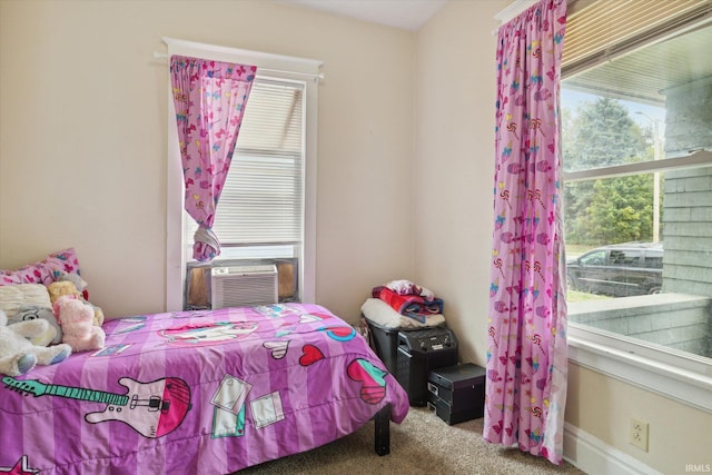 carpeted bedroom with cooling unit