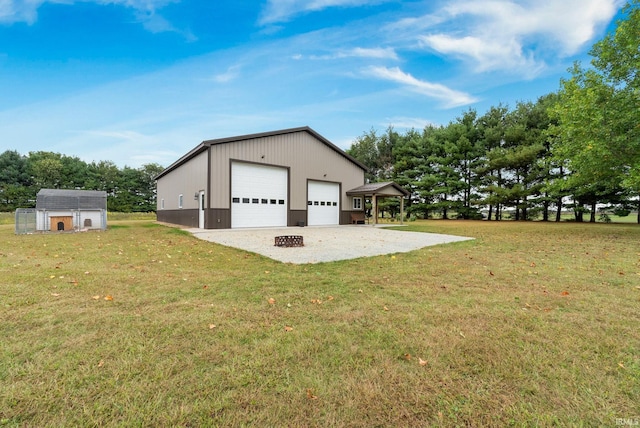 garage with a yard