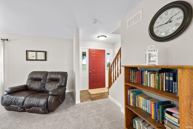 living area with carpet flooring