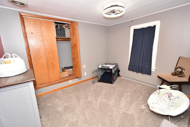 bedroom featuring carpet and a closet