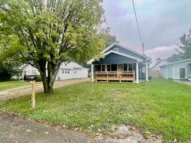 bungalow with a front lawn