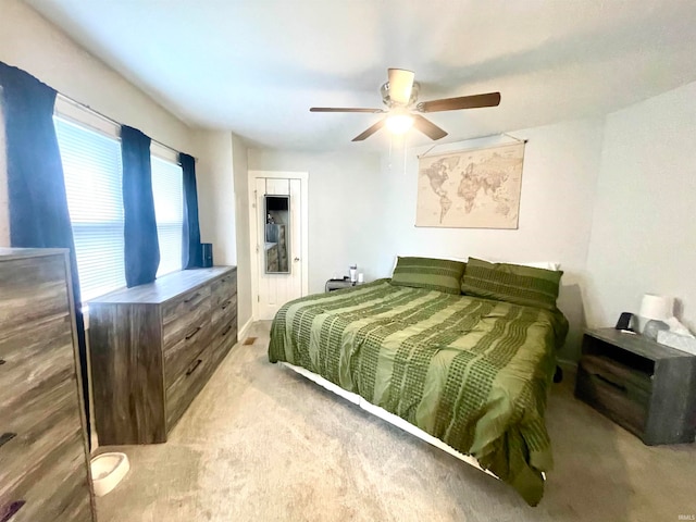 bedroom featuring ceiling fan and carpet flooring