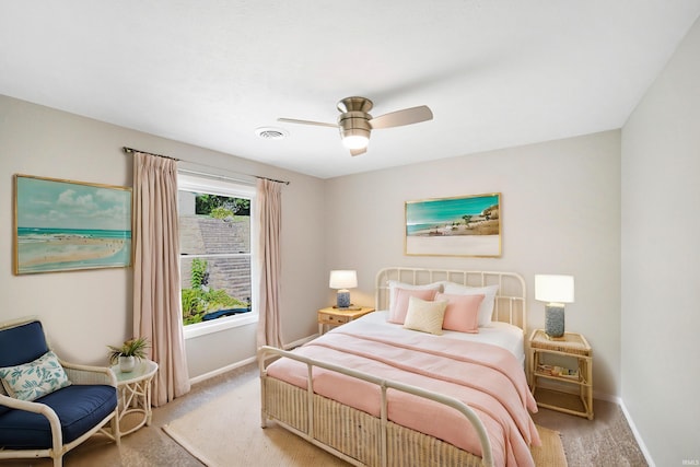 bedroom featuring ceiling fan and light colored carpet