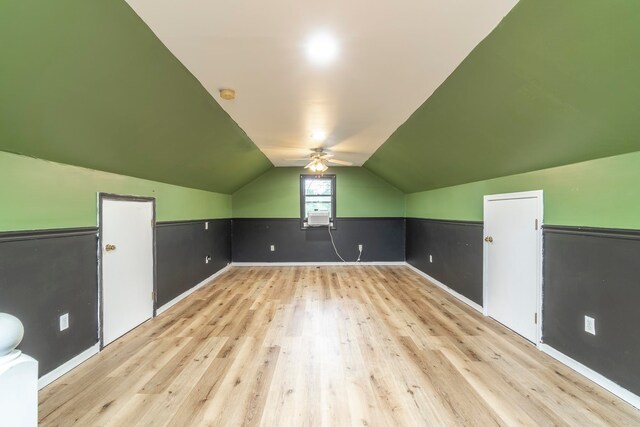 bonus room featuring light hardwood / wood-style flooring, lofted ceiling, and ceiling fan