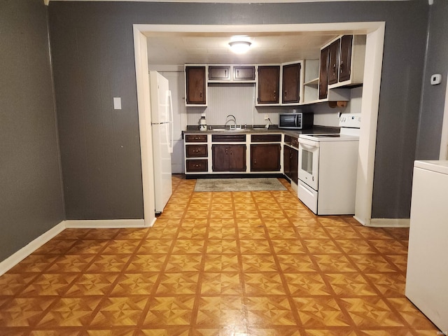 kitchen featuring white appliances, sink, dark brown cabinets, and light parquet floors