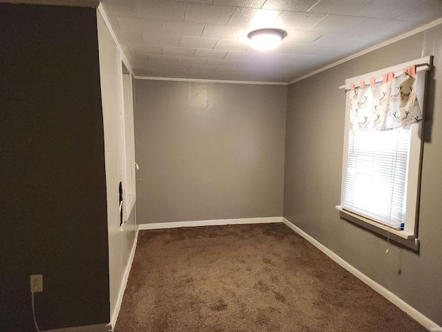 carpeted spare room with ornamental molding