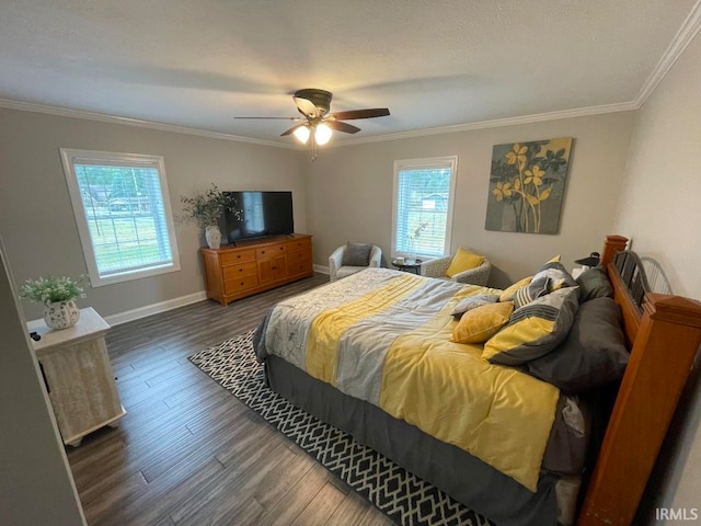 bedroom featuring crown molding, ceiling fan, and dark wood-type flooring