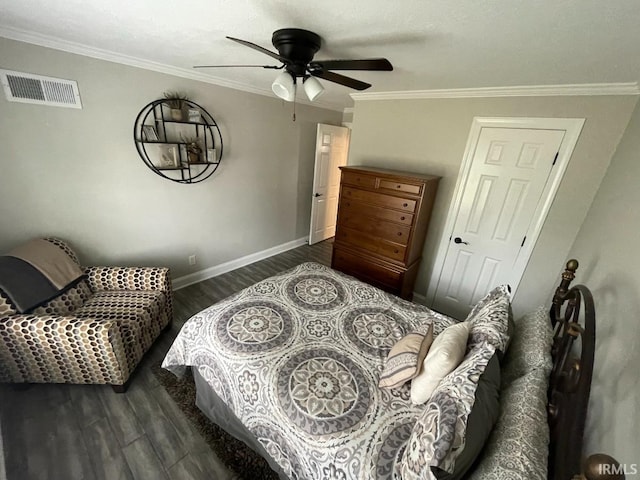 bedroom featuring baseboards, visible vents, a ceiling fan, wood finished floors, and ornamental molding