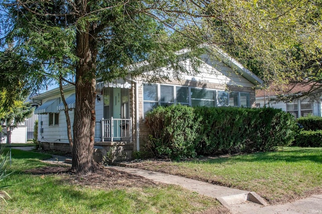 view of front of home with a front yard