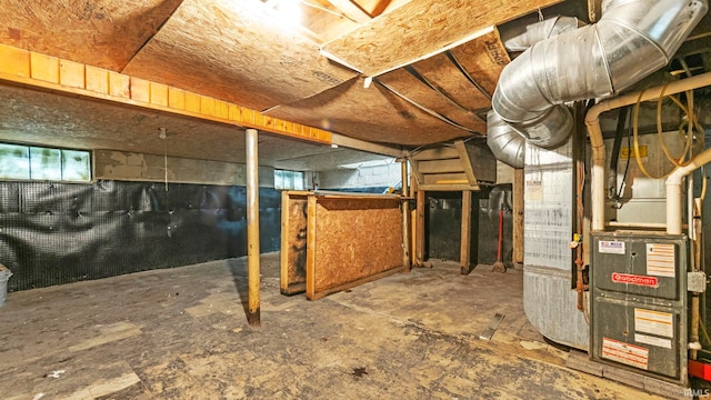 basement featuring heating unit