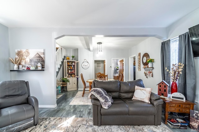 living room with dark hardwood / wood-style floors