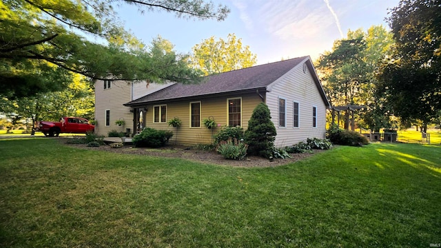 view of property exterior featuring a yard